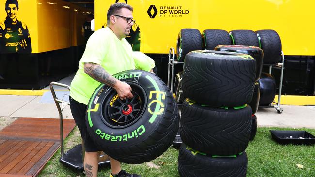 A Renault team member packs up tyres after the Grand Prix was cancelled. Picture: Robert Cianflone/Getty Images