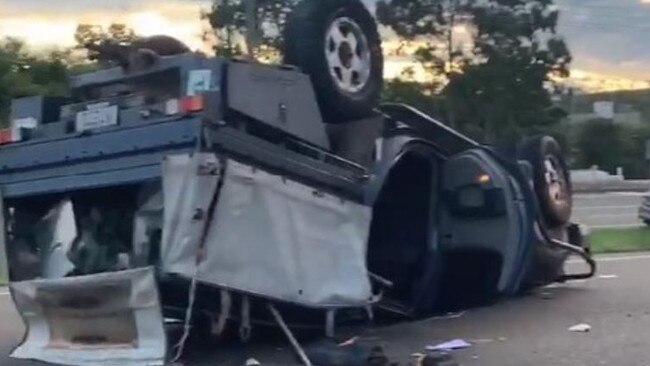 A single-vehicle rollover on the Bruce Hwy near Townsville yesterday. Picture: Facebook