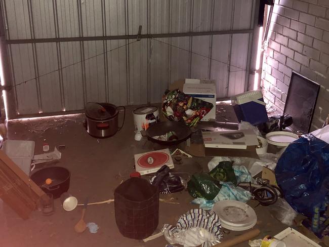 The woman believes a homeless person had been living in her garage for up to three months.