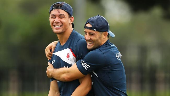 Manu and Cronk share a laugh. (Mark Kolbe/Getty Images)