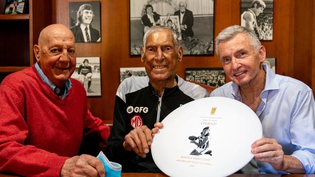 Russell Ebert presented with his South Australian Sport Hall of Fame Legend status last year by Barrie Robran and Bruce McAvaney. Picture: Jordan Bianchini from PAFC.