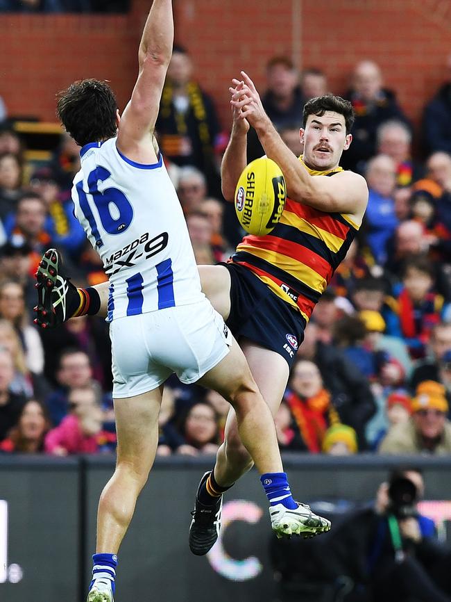 Mitch McGovern flies against the Kangaroos. Picture: Mark Brake/Getty Images