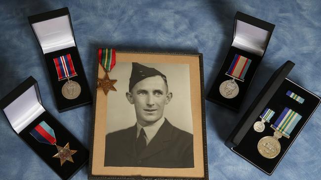 The service medals belonging to Lewis William English who served in the Royal Australian Air Force during WWII. Picture: George Salpigtidis