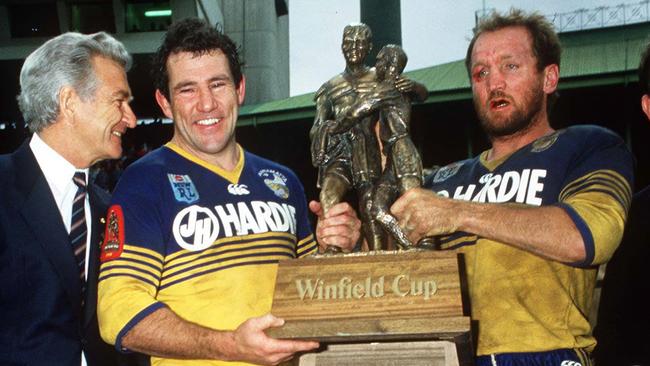 Prime Minister Bob Hawke with Parramatta greats Michael Cronin and Ray Price after winning the 1986 grand final. Picture: Action Photographics