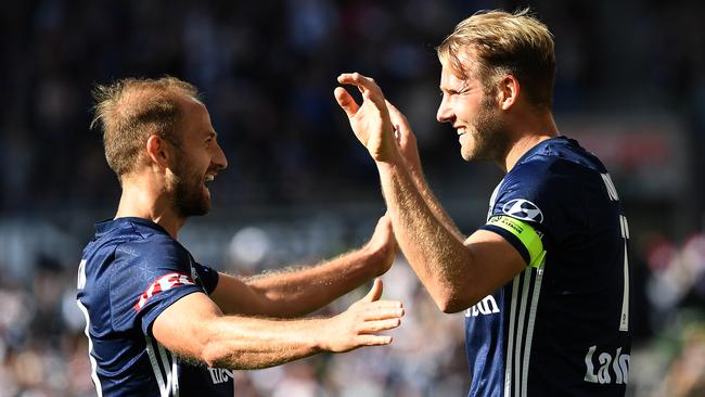 Migjen Basha, left, and Nils Ola Toivonen of Melbourne Victory after Toivonen scored a goal during the round-11 A-League match against Melbourne City FC on Saturday. Picture: AAP