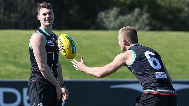 Blake Acres with Seb Ross at St Kilda training. Picture: Ian Currie