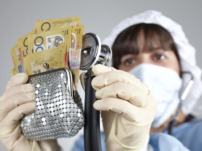 Generic of a doctor conducting a health check on money (a number of $50 notes).