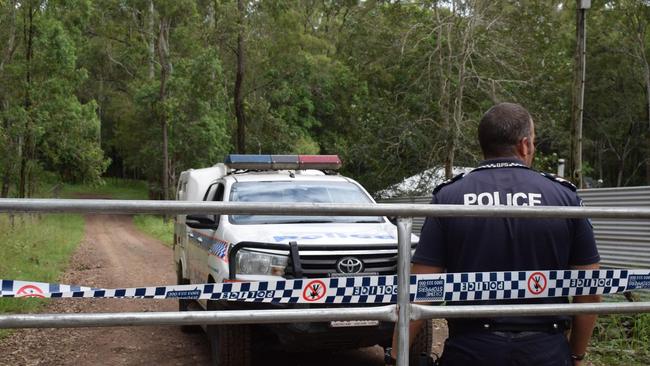 Senior Constable Bill Greer guards the entrance to an Amamoor property where a man was shot in the head in March. 