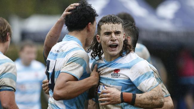 NSW's Solomon Tuqiri and Zac Sarfati celebrate Solomon's try.