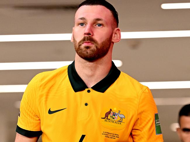 DOHA, QATAR - JUNE 13:  Martin Boyle of Australia walks onto the field ahead of the 2022 FIFA World Cup Playoff match between Australia Socceroos and Peru at Ahmad Bin Ali Stadium on June 13, 2022 in Doha, Qatar. (Photo by Joe Allison/Getty Images)