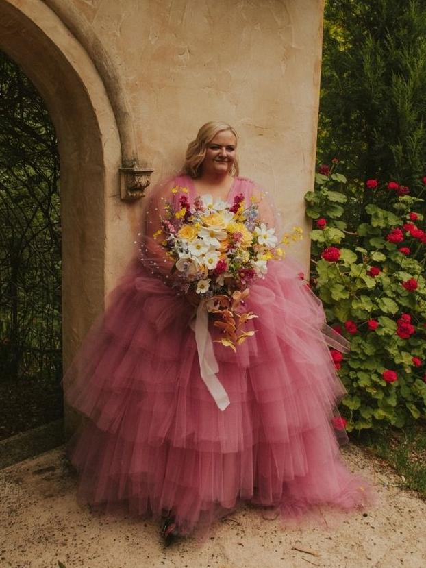 Caity Richardson made her own wedding dress and bouquet. Picture: Good Lovin Photography