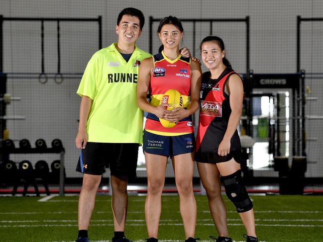 Siblings West Adelaide runner Jerome Martin, Adelaide Crows AFLW player Hannah Martin, West Adelaide SANFLW player Rachelle Martin pictured at the Adelaide Crows training centre, West Lakes on Thursday 28 February, 2019. (AAP Image/Sam Wundke)