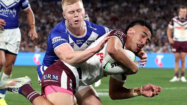 SYDNEY, AUSTRALIA - AUGUST 30:  Lehi Hopoate of the Sea Eagles scores a try during the round 26 NRL match between Canterbury Bulldogs and Manly Sea Eagles at Accor Stadium on August 30, 2024, in Sydney, Australia. (Photo by Cameron Spencer/Getty Images)