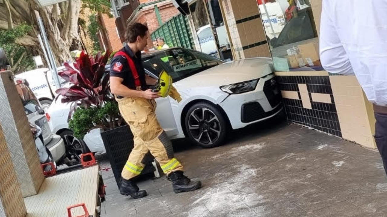 A white Audi has crashed into a store from in Sydney's affluent suburb Rose Bay.