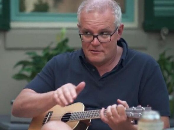 Scott Morrison playing a ukulele during a 60 Minutes interview.