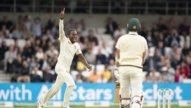 England's Jofra Archer celebrates after taking his 5th wicket, that of Australia's Pat Cummins, right, caught by Jonny Bairstow for 0 on the first day of the 3rd Ashes Test cricket match between England and Australia at Headingley cricket ground in Leeds, England, Thursday, Aug. 22, 2019. (AP Photo/Jon Super)