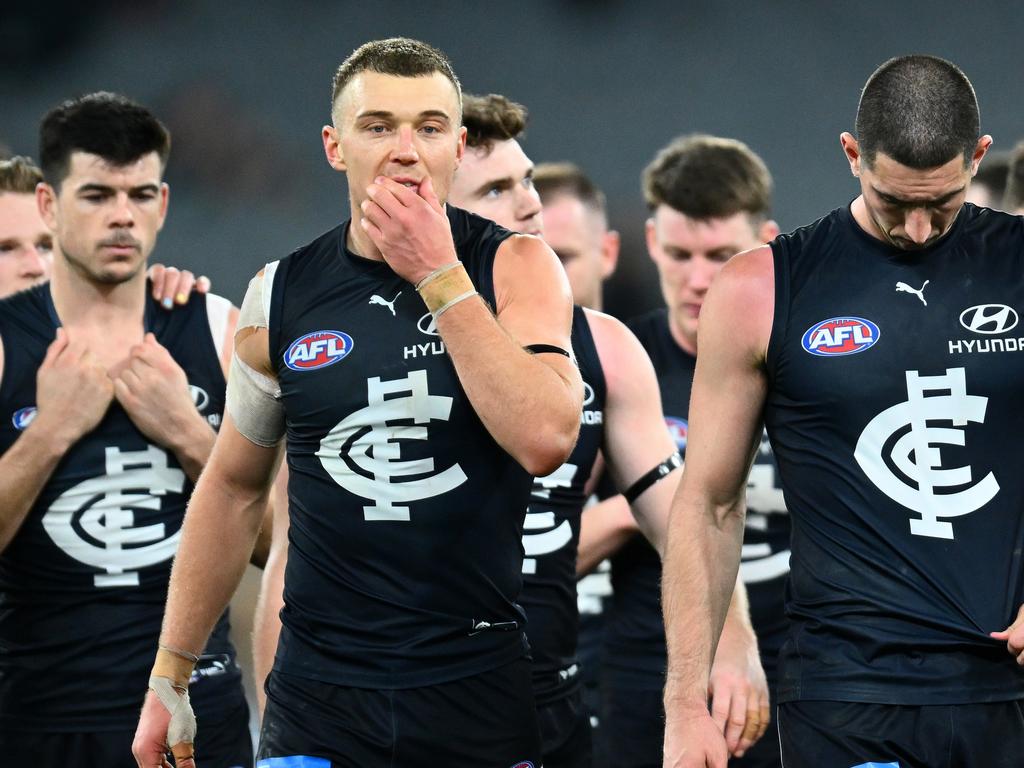 Melbourne, Australia. 02nd June, 2023. Patrick Cripps of Carlton leads  teammates from the field during the AFL Round 12 match between the  Melbourne Demons and the Carlton Blues at the Melbourne Cricket