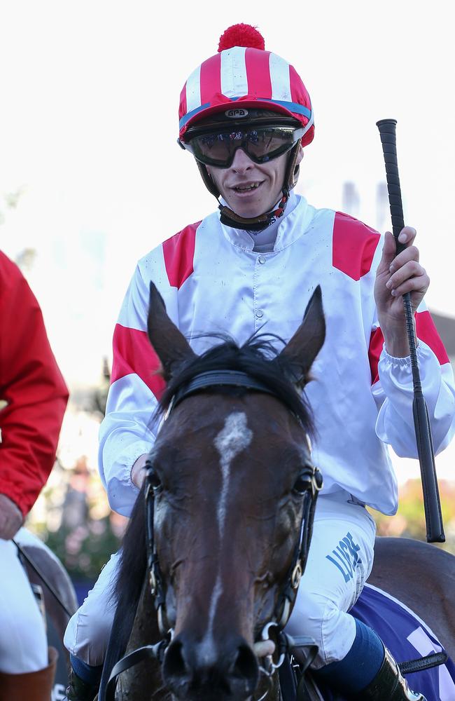 Jockey Michael Dee returns to scale on Big Night Out after claiming victory at Flemington last year.