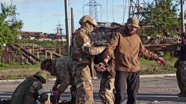 Video released by the Russian Defence Ministry shows Ukrainian service members after surrendering the Azovstal steel plant in Mariupol. Picture: AFP.