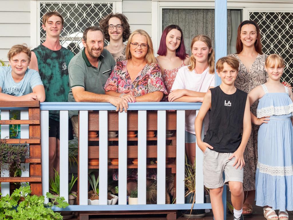 ‘We all take turns’ … Jeni and Ray Bonell with some of their 16 kids: Eric, Nate, Brandon, Jeni, Eve, Rachel, Damien, Sabrina and Katie. Picture: David Martinelli.