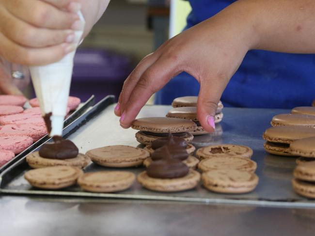 All the elements come together as the macaroons get their finishing touches.Photo Tessa Mapstone / South Burnett Times