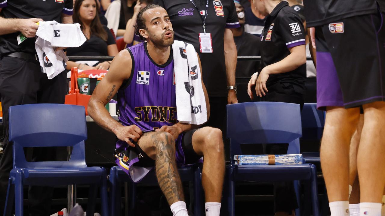 Xavier Cooks of the Kings sits on the bench during game one of the NBL Grand Final series between Sydney Kings and New Zealand Breakers at Qudos Bank Arena. Photo: Jenny Evans/Getty Images.