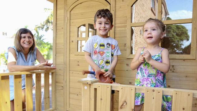 Kerry Philips, pictured with her grandchildren Frank Focas, 3 and Sophia Kotsis, 2, said she gives them her own time for “free play”. Picture: Justin Lloyd