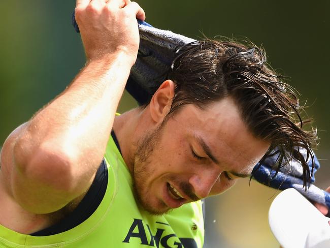 MELBOURNE, AUSTRALIA - DECEMBER 16: Michael Hibberd of the Demons cools off during a Melbourne Demons AFL training session at Gosch's Paddock on December 16, 2016 in Melbourne, Australia. (Photo by Quinn Rooney/Getty Images)