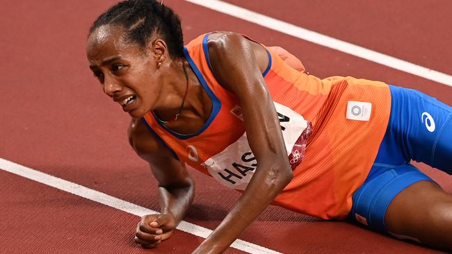 Netherlands' Sifan Hassan is spent after winning the women's 10,000m final. Picture: Ina Fassbender/AFP