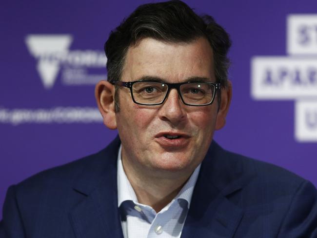 MELBOURNE, AUSTRALIA - OCTOBER 20: Victorian Premier Daniel Andrews speaks to the media during a press conference on October 20, 2020 in Melbourne, Australia. Victoria has recorded one locally acquired COVID-19 case in the last 24 hours. Coronavirus restrictions have eased further in Victoria as of 11:59 on Sunday 18 October, with Melbourne residents are now able to travel up to 25km from their homes, and no limits on the time people spend outside their homes exercising. People must continue to stay at home unless for the four permitted reasons Ã¢â¬â to shop for food and other necessary goods; for care or compassionate reasons; for work or education; for exercise or social interaction, and from Monday, people can also now go to the hairdresser. Up to 10 people from two households can also now meet outdoors, while tennis, golf, bocce and skate parks are now able to open. (Photo by Daniel Pockett/Getty Images)