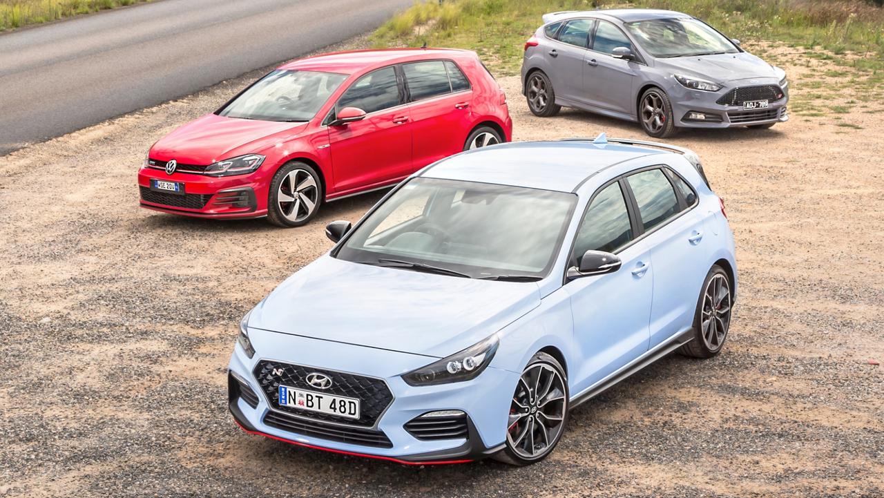 Hyundai i30N, VW Golf GTI and Ford Focus ST in hot hatch shootout ...