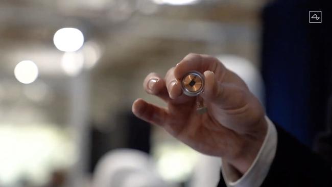 The prototype is about the size of a large coin. Picture: Neuralink / AFP