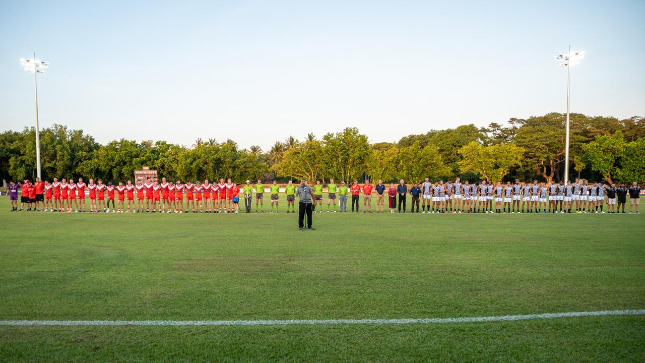 The Waratahs pay tribute to late, great ruckman Alexander ‘Rooch’ Aurrichio at the first game under lights at Gardens Oval. Picture: Aaron Black/AFLNT Media