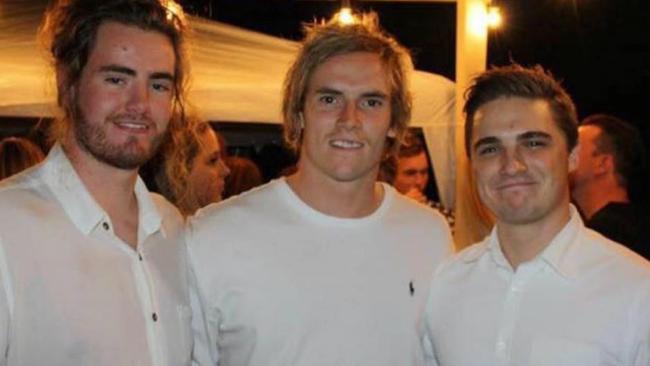 James Lord (middle) with mates.