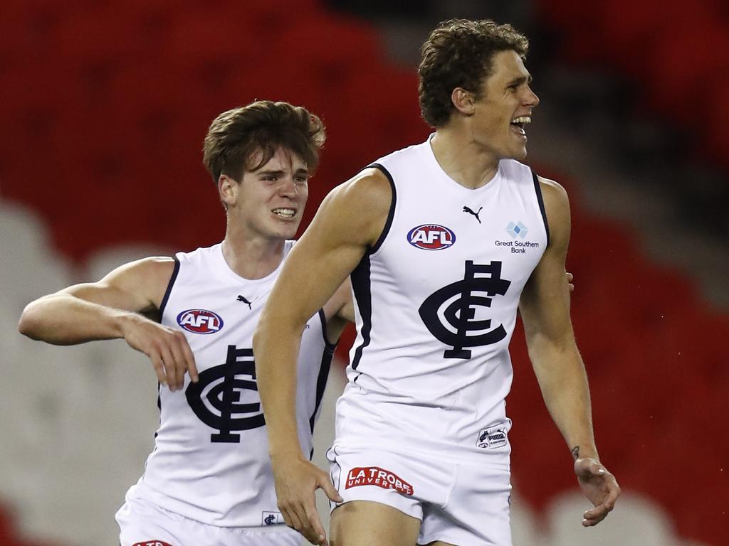 Charlie Curnow (R) played his first AFL game in over two years on Friday night. (Photo by Darrian Traynor/Getty Images)