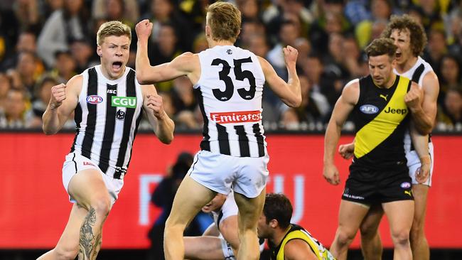 Jordan De Goey celebrates a goal in the preliminary final win over Richmond.