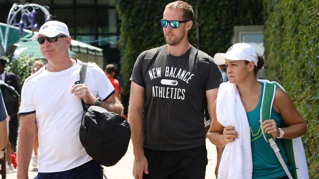 Barty arrives with coach Craig Tyzzer and strengh and conditioning coach Mark Taylor. Picture: Ella Pellegrini