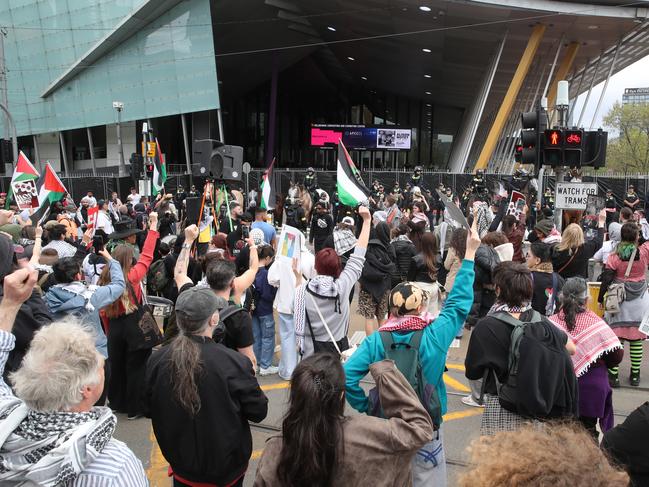 Police hold a line in front of anti-war protesters ahead of Land Forces expo last month. Picture: David Crosling