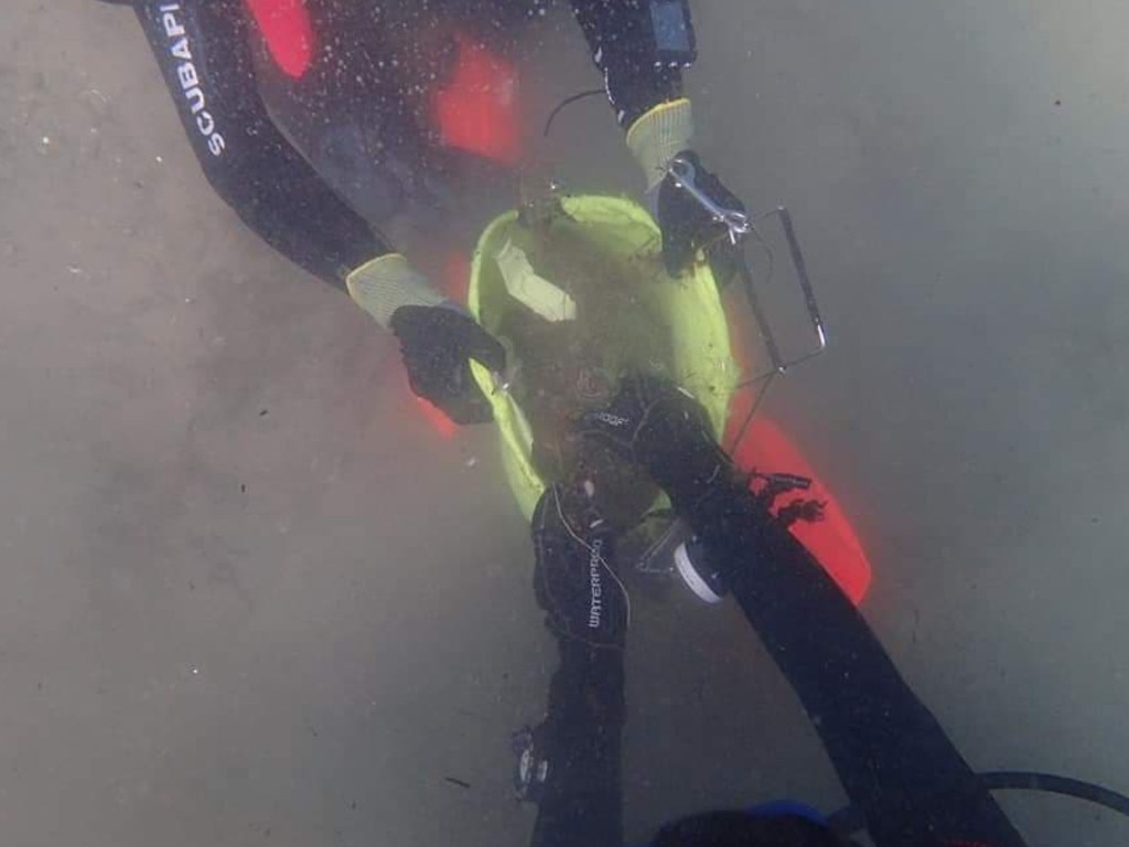 Environmental divers clean up the Gold Coast Seaway. This year they removed 1.75 tonnes from the waterways. Picture: supplied