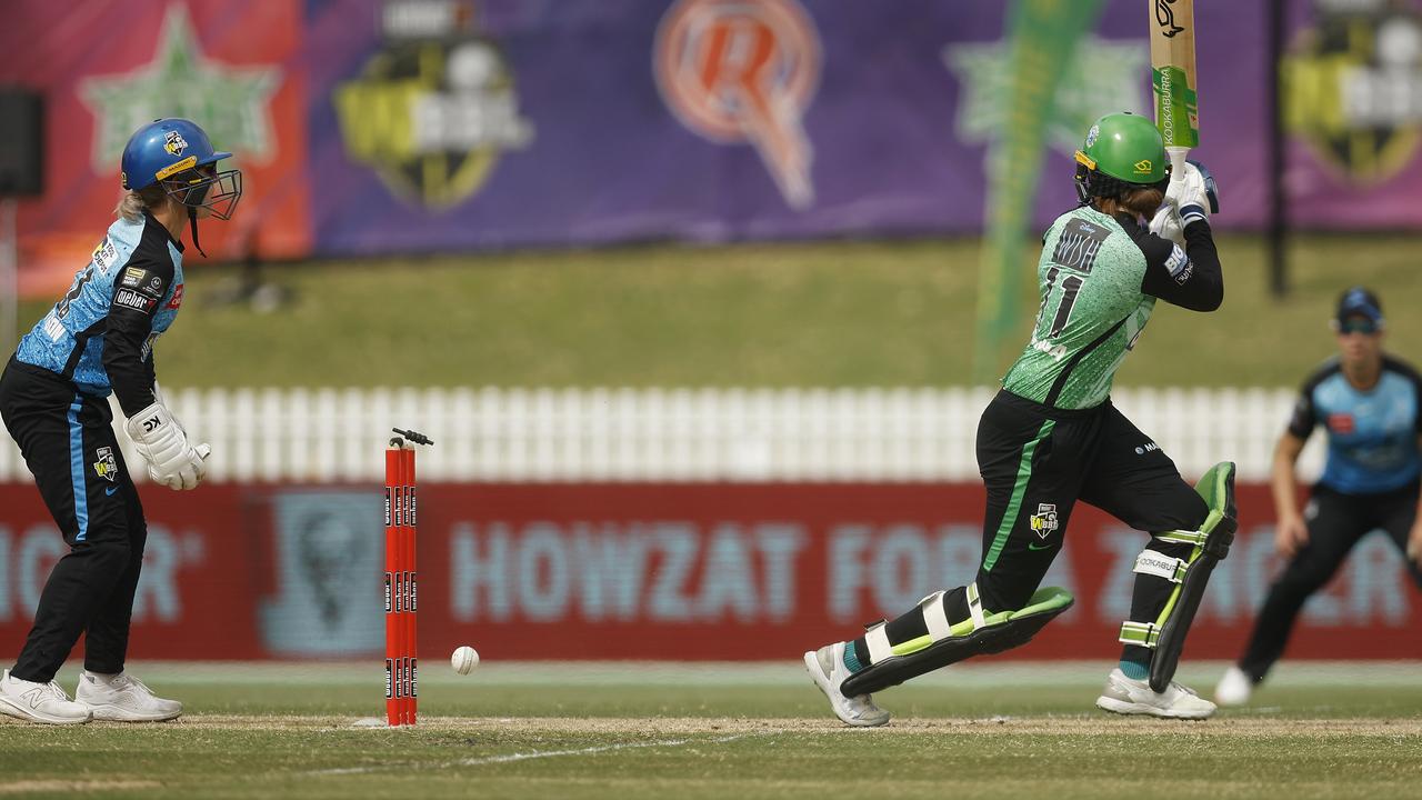The ball bounces off the leg of Bridget Patterson of the Strikers before hitting the stumps dismissing Rhys McKenna of the Stars. Photo by Daniel Pockett/Getty Images
