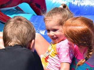 Aleah, 3, and Harra Brown from Woolgoolga were surprised with a trip to the Yamba Bowlo Water Slide Day. Picture: Jenna Thompson