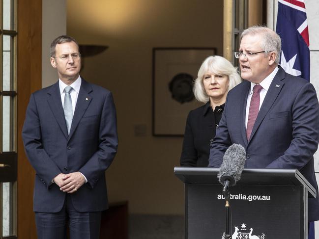 Prime Minister Scott Morrison with Christine Morgan, National Suicide Prevention Adviser, and Deputy Chief Medical Officer Professor Michael Kidd. Picture: Gary Ramage