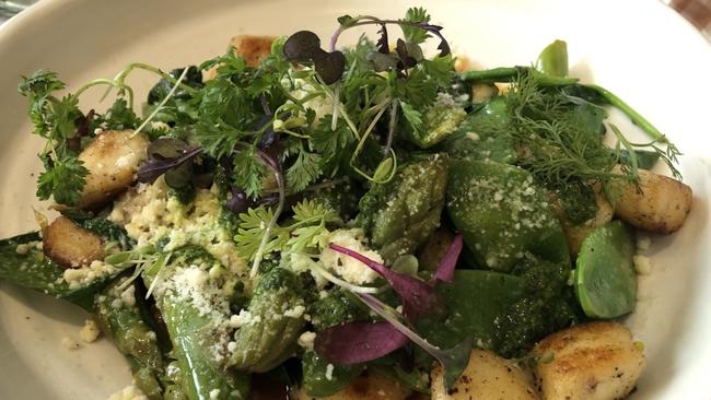 Fried gnocchi with asparagus and sugar snap peas.