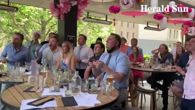 Punters at the Duke of Wellington watch the Melbourne Cup