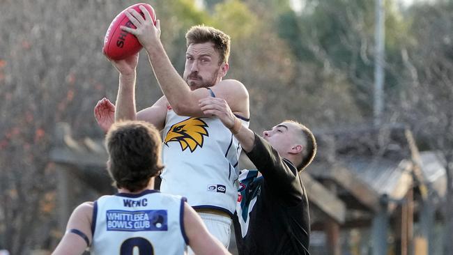 Whittlesea’s Matthew Atta marks strongly. Picture: George Sal