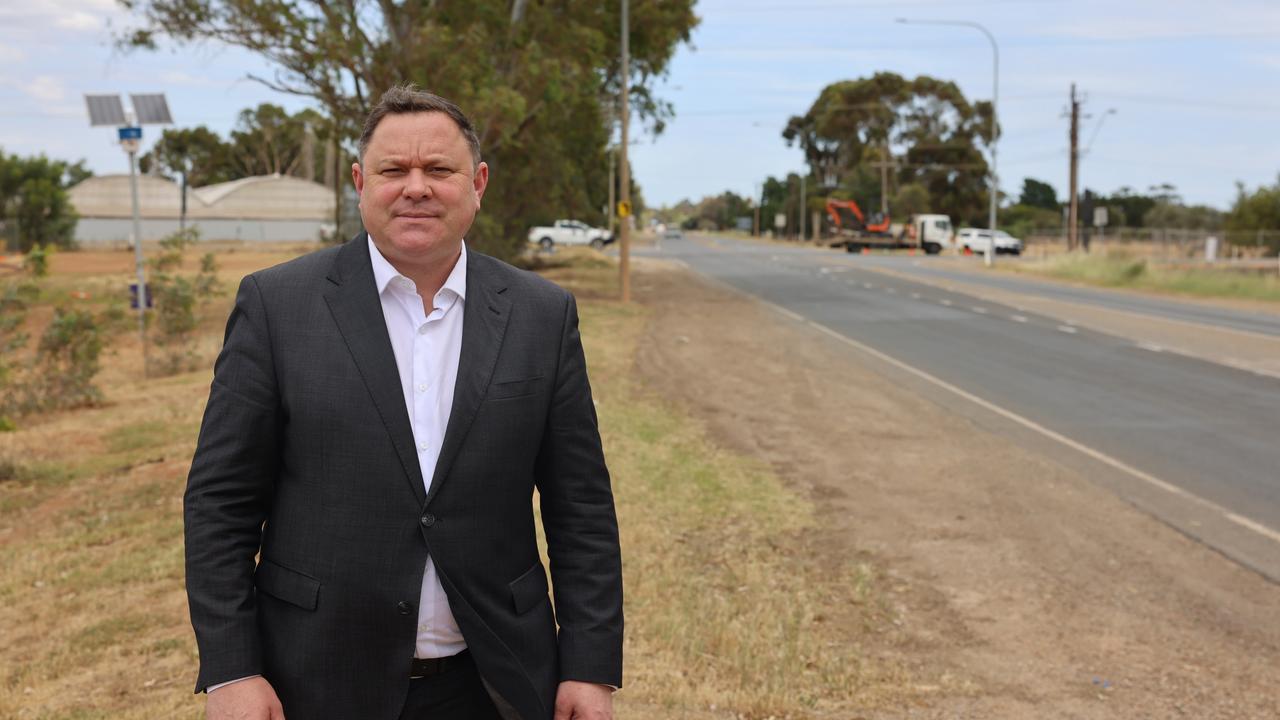 Federal MP for Spence Matt Burnell at the Curtis Road and Heaslip Road intersection where a $30m federal and state grant has been awarded to fix the notorious intersection