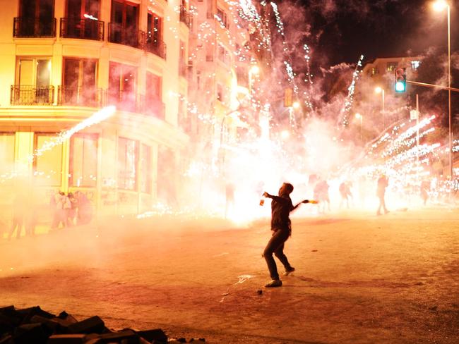 Taksim in uproar ... protesters clash with riot policemen in Istanbul in June 2013. Picture: AFP Photo/Bulent Kilic