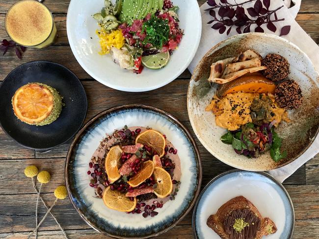 Bellagio Cafe’s Breakfast Salad; Orange and Cacao 5 Grain Porridge; Summer Poke Bowl; Orange, Almond and Pistachio Cake; and a turmeric latte. Picture: Jenifer Jagielski