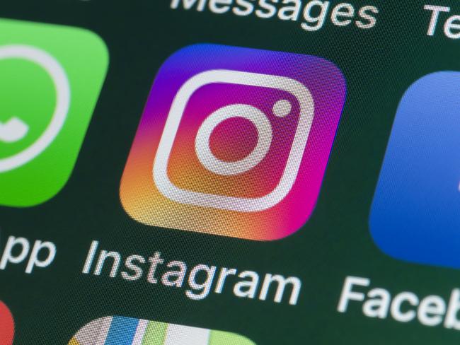 London, UK - July 30, 2018: The buttons of the photo app Instagram, surrounded by WhatsApp, Facebook, Messages and other apps on the screen of an iPhone. Picture: iStock