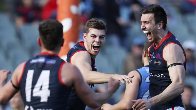 Matthew Panos (right) celebrates in last season’s elimination final. Could he be the man to take over from Jace Bode? Picture: Sarah Reed